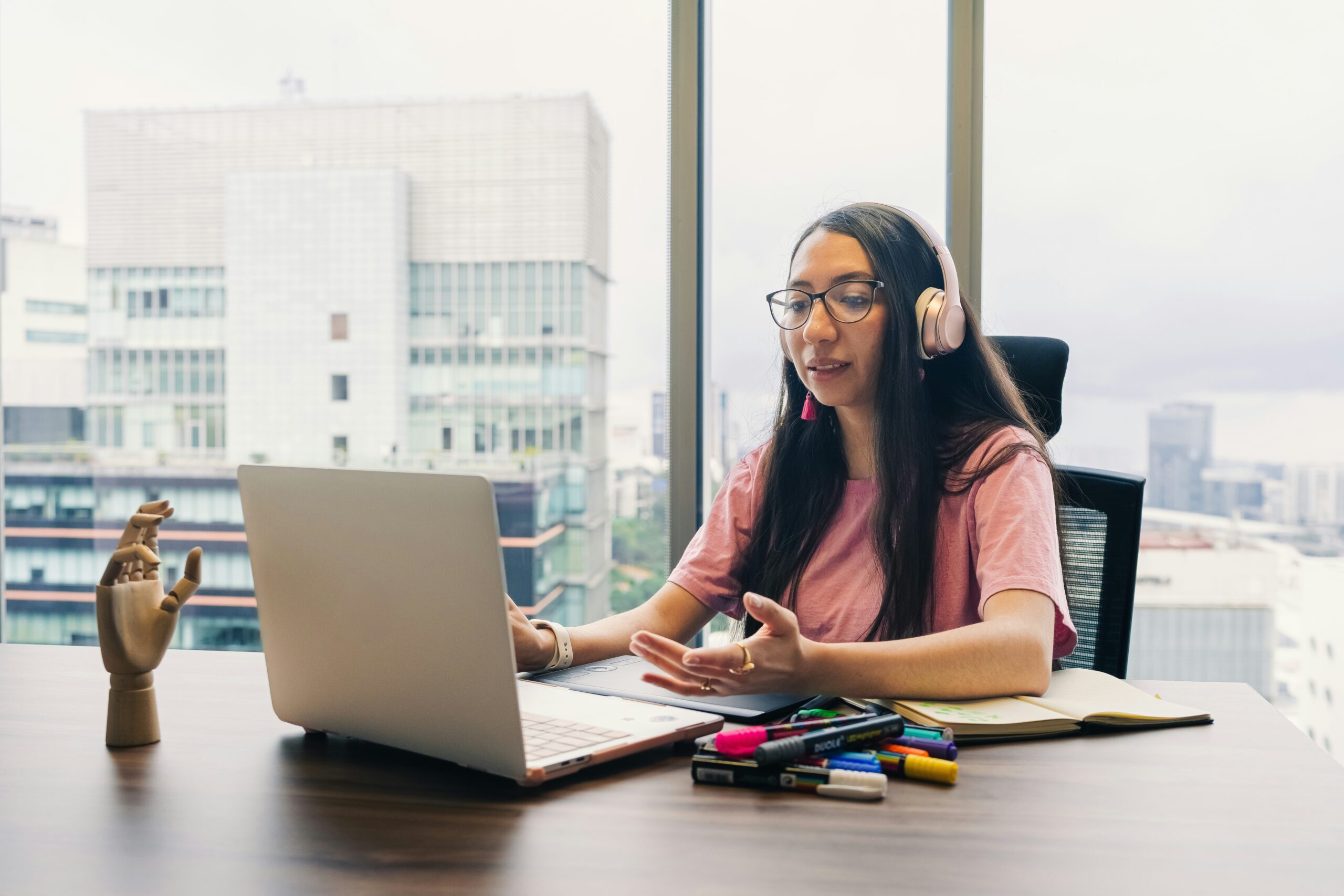Student by window taking IELTS speaking test